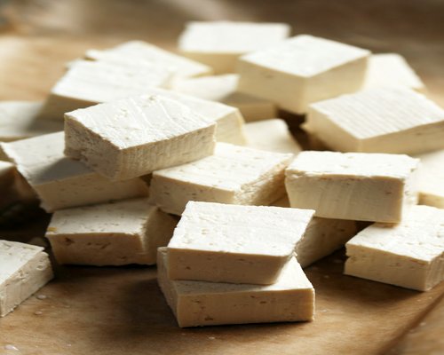 Organic tofu cut in cubes prepared for traditional home cooking